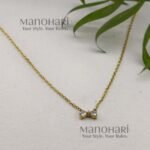 **Elina Bow Elegance Necklace crafted from premium stainless steel with luxurious 18K Gold PVD plating, featuring a delicate minimalist bow pendant that is waterproof, anti-tarnish, and skin-safe for women.**