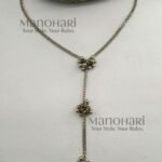 **Nupurika Ghungroo Heritage Necklace crafted from premium oxidised alloy with an antique finish, featuring delicate ghungroo bell detailing on a 38 cm single-strand chain with a secure lobster clasp for timeless ethnic elegance.**