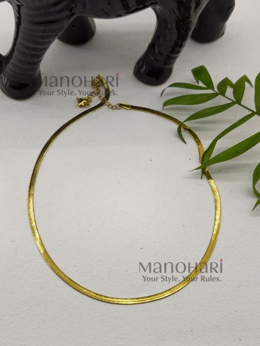 **Elara Layering Chain Necklace crafted from premium brass with an anti-tarnish finish, featuring a sleek minimalist flat chain design and elegant 22.5 cm length for women.**