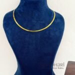 **Elara Layering Chain Necklace crafted from premium brass with an anti-tarnish finish, featuring a sleek minimalist flat chain design and elegant 22.5 cm length for women.**