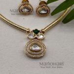 **Zarina Kundan Heritage Necklace Set crafted from premium brass with a radiant high gold polished finish, featuring a traditional Kundan-inspired pendant and matching earrings for women.**