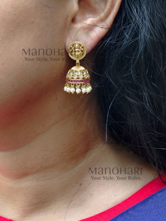 MN-PS-TMP-APT-01_1 **Aditi Pearl Temple Pendant Set crafted from premium brass and copper metal with a luxurious Matte Gold Polish finish, featuring a 3 cm temple-inspired pendant, matching 3 cm jhumka earrings, clustered pearls, and artificial stones for women.**