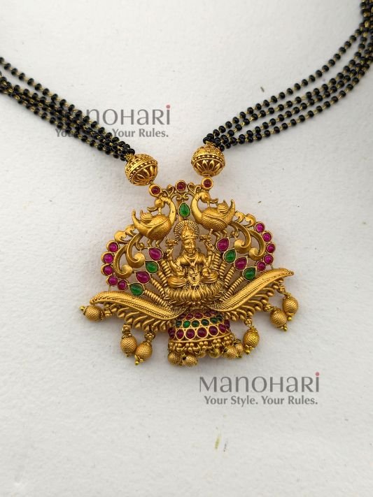 **Lakshmi Vaibhav Temple Pendant Set crafted from premium copper, brass, and metal alloy with a Mehendi Gold antique finish, featuring a traditional Goddess Lakshmi pendant and matching temple earrings for women.**