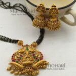 **Lakshmi Vaibhav Temple Pendant Set crafted from premium copper, brass, and metal alloy with a Mehendi Gold antique finish, featuring a traditional Goddess Lakshmi pendant and matching temple earrings for women.**