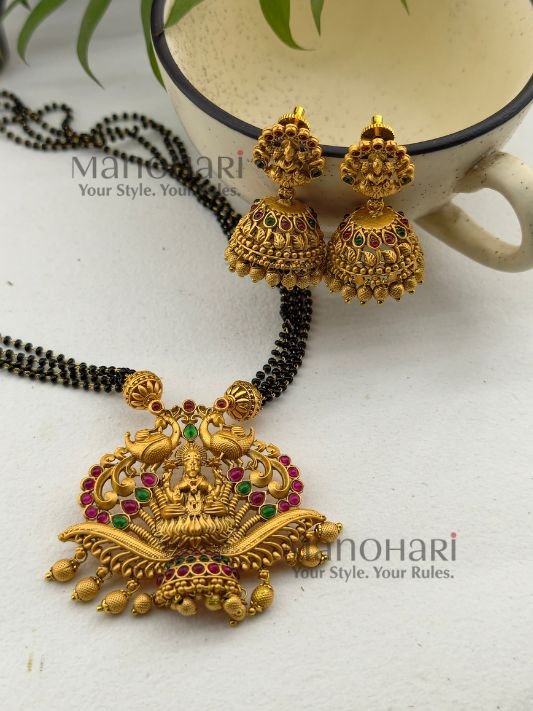 **Lakshmi Vaibhav Temple Pendant Set crafted from premium copper, brass, and metal alloy with a Mehendi Gold antique finish, featuring a traditional Goddess Lakshmi pendant and matching temple earrings for women.**