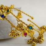 **Zariya Kashmiri Ghungroo Bangles featuring a radiant gold-plated finish, sparkling artificial stones, and a traditional Kashmiri-inspired ghungroo design with an adjustable fit and 6 cm inner diameter, perfect for festive and ethnic wear.**