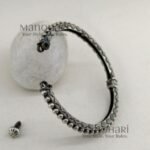 **Aarohi Heritage Silver Bangle crafted from premium brass with an elegant oxidised silver-plated finish, featuring a vintage-inspired openable design and a comfortable 6 cm inner diameter for timeless ethnic elegance.**