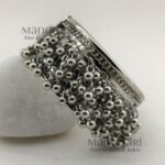 **Aarvi Silver Ghungroo Bracelet crafted from premium alloy metal with an elegant silver-tone finish, featuring delicate ghungroo detailing, an openable fold-over clasp, and a comfortable 6 cm inner diameter, perfect for festive and ethnic styling.**