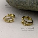 Elara Molten Gold Hoop Earrings with smooth sculptural curves and polished gold finish for women, contemporary statement jewellery