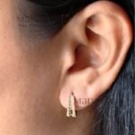 Elara Molten Gold Hoop Earrings with smooth sculptural curves and polished gold finish for women, contemporary statement jewellery