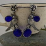 Navya Monalisa Garden 5.5 cm oxidised brass stud earrings with floral and bird motif for women