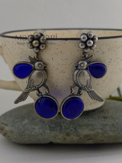 Navya Monalisa Garden 5.5 cm oxidised brass stud earrings with floral and bird motif for women
