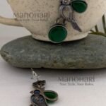Navya Monalisa Garden 5.5 cm oxidised brass stud earrings with floral and bird motif for women