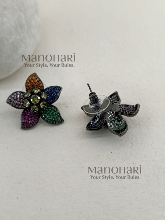 MN-ER-RBS-ELA-01_1 Elara Rainbow Bloom multicolor AD stud earrings with artificial colorful stones, black rhodium polished brass base and 3 cm floral design for women
