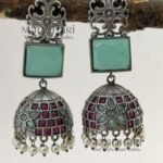 Nivya Silver Heritage statement jhumka earrings with silver-look finish, brass base, 8 cm length and 2.5 cm jhumka diameter for women