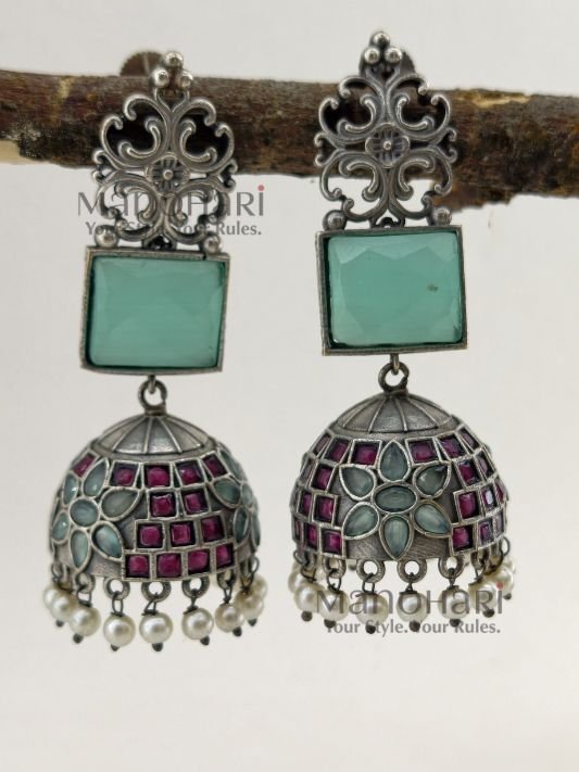 Nivya Silver Heritage statement jhumka earrings with silver-look finish, brass base, 8 cm length and 2.5 cm jhumka diameter for women
