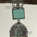 Nivya Silver Heritage statement jhumka earrings with silver-look finish, brass base, 8 cm length and 2.5 cm jhumka diameter for women