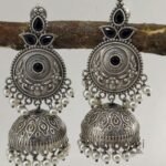 Aira Silver Petal German Silver jhumka earrings with floral design, oxidised silver finish, 7 cm length and 2.5 cm jhumka diameter for women