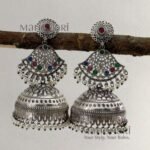 Ishira Tribal Heritage Jhumkas with silver-look finish, stone-studded design and pearl hangings, 8 cm traditional statement earrings for women