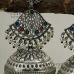 Ishira Tribal Heritage Jhumkas with silver-look finish, stone-studded design and pearl hangings, 8 cm traditional statement earrings for women