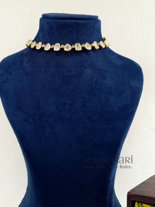 MN-JS-KUN-NAV-01_1 Navya Gold Kundan Grace jewellery set with high gold polish and artificial Kundan-style stones on a brass base for women