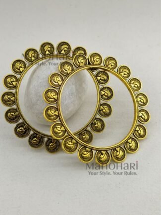 **Svara Dual Tone Heritage Kada Pair crafted in an elegant oxidised metal and golden-tone finish, featuring a heritage-inspired Banjara and Boho Chic design with a comfortable 5.5 cm inner diameter and a secure non-openable fit for timeless ethnic styling.**
