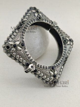 **Aaradhya Temple Stone Cuff Kada featuring a vintage stone-studded design with a classic temple-inspired look, elegant cuff style, and comfortable 5.5 cm inner diameter, perfect for festive and ethnic wear.**