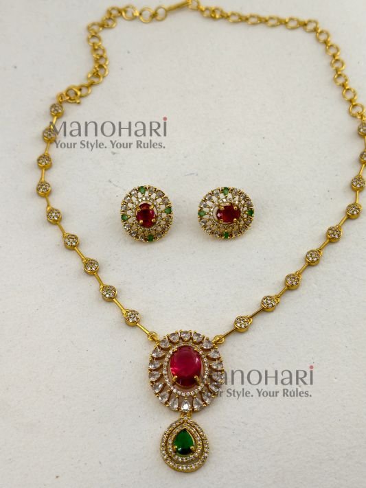 MN-NK-ADC-NIV-01_1 Nivya Crystal Elegance AD necklace with sparkling artificial stones, premium brass design and matching earrings for women