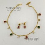 Aaradhya Floral AD layered necklace set with matte gold-plated finish, floral design and rectangular stone accents for women