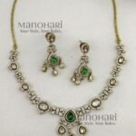 Vanya Emerald Royal Victorian necklace set with emerald green stones, antique gold finish and matching drop earrings for women
