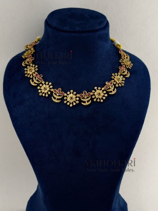 MN-NK-HRT-IRH-01_3 **Ira Royal Heritage Necklace Set crafted from premium brass with a luxurious gold finish, adorned with sparkling artificial stones, featuring an elegant traditional neckpiece and matching earrings for weddings, festive occasions, and timeless ethnic styling.**