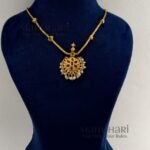 **The Meher Antique Kemp Necklace Set is a timeless celebration of South Indian heritage, crafted from **premium brass** with a luxurious **matte gold-plated finish**. Embellished with vibrant **traditional Kemp stones**, this elegant necklace showcases intricate temple-inspired craftsmanship that radiates regal charm. The **21 cm necklace** features an **adjustable extension chain** for a comfortable fit, while the matching **4.5 cm earrings** complete the coordinated look. Perfectly paired with **Kerala Kasavu sarees, Kanchipuram silk sarees, lehengas, Anarkalis, and other traditional attire**, this exquisite jewellery set is ideal for **Onam, weddings, temple visits, engagements, receptions, festivals, and bridal celebrations**. Exclusively curated by **Manohari Style**, the **Meher Antique Kemp Necklace Set** combines heritage artistry, premium craftsmanship, and timeless elegance, making it a treasured addition to every woman's ethnic jewellery collection.**