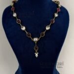 Navya Royal Kundan necklace set with traditional design, Mehendi polish and brass base for women, ideal for weddings and festive occasions