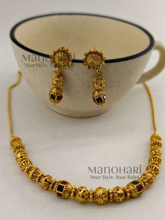 **Vaidehi Temple Beaded Necklace Set crafted from premium brass, adorned with vibrant artificial stones and multicolour beads, featuring an elegant 18 cm temple-inspired necklace with an adjustable extensible chain and matching 4 cm earrings for timeless ethnic elegance.**