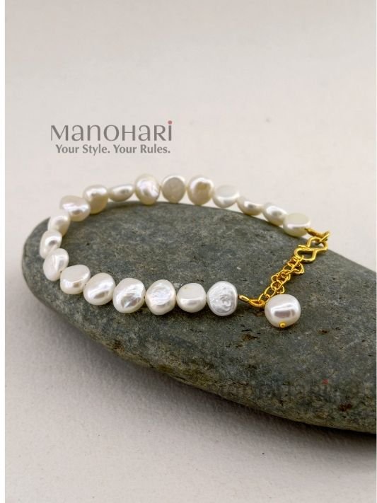 Kiara Freshwater Pearl Charm Bracelet featuring elegant freshwater pearls, designed for women’s everyday, festive and contemporary jewellery styling.