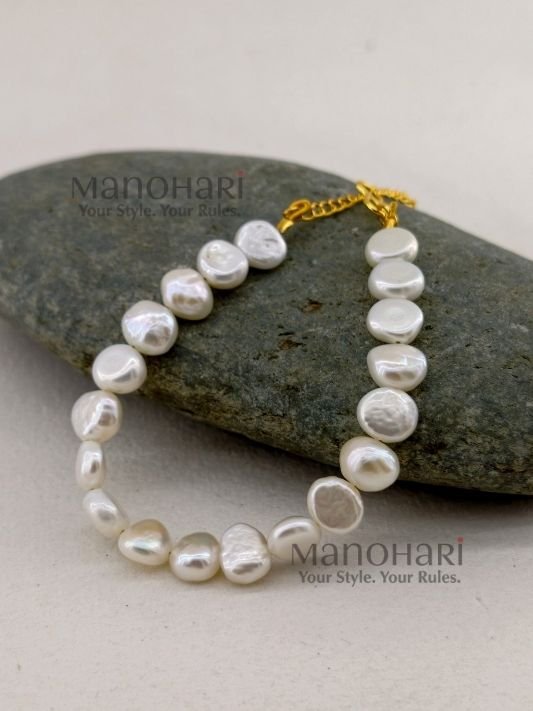 Kiara Freshwater Pearl Charm Bracelet featuring elegant freshwater pearls, designed for women’s everyday, festive and contemporary jewellery styling.