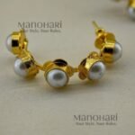 Kiara Baroque Pearl Radiance Hoops crafted from brass with a gold-plated finish, featuring a round golden baroque-inspired design.