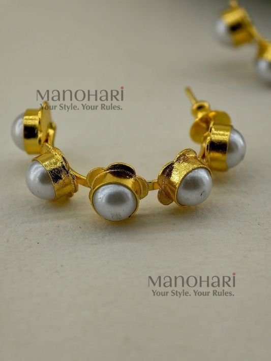 Kiara Baroque Pearl Radiance Hoops crafted from brass with a gold-plated finish, featuring a round golden baroque-inspired design.