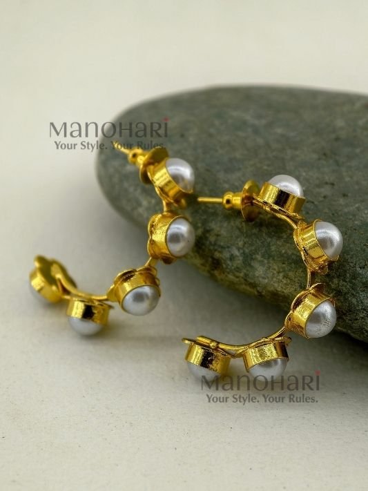 Kiara Baroque Pearl Radiance Hoops crafted from brass with a gold-plated finish, featuring a round golden baroque-inspired design.