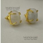 Ishira Golden Oval Elegance gold-plated oval stud earrings with natural stone detailing and brass finish