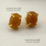 Ishira Golden Oval Elegance gold-plated oval stud earrings with natural stone detailing and brass finish