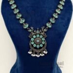 Aadhya Peacock Heritage Oxidised necklace set with mint colour accents, 20 cm chain and 5 cm matching earrings