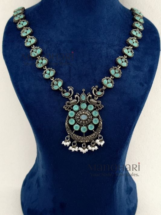 MN-JS-OXI-AAD-01_1 Aadhya Peacock Heritage Oxidised necklace set with mint colour accents, 20 cm chain and 5 cm matching earrings