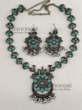 Aadhya Peacock Heritage Oxidised necklace set with mint colour accents, 20 cm chain and 5 cm matching earrings