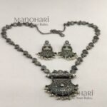 Naira Silver Rustic Elegance long haram necklace set with oxidised silver finish and matching 5 cm earrings